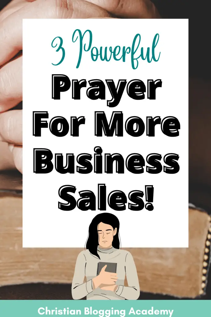 woman with hands folded on Bible praying for business sales 