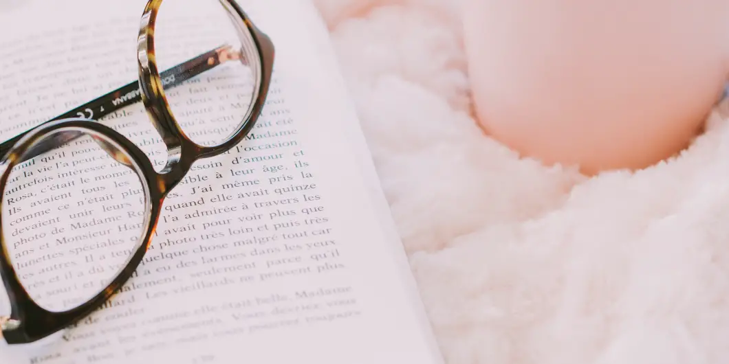 glasses, candle, and journal