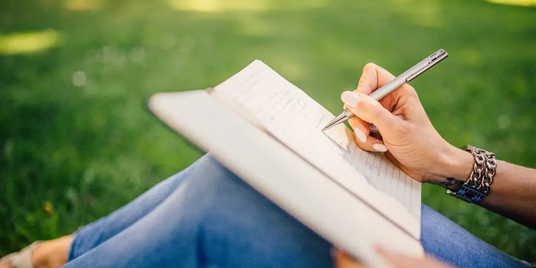 girl writing in a book