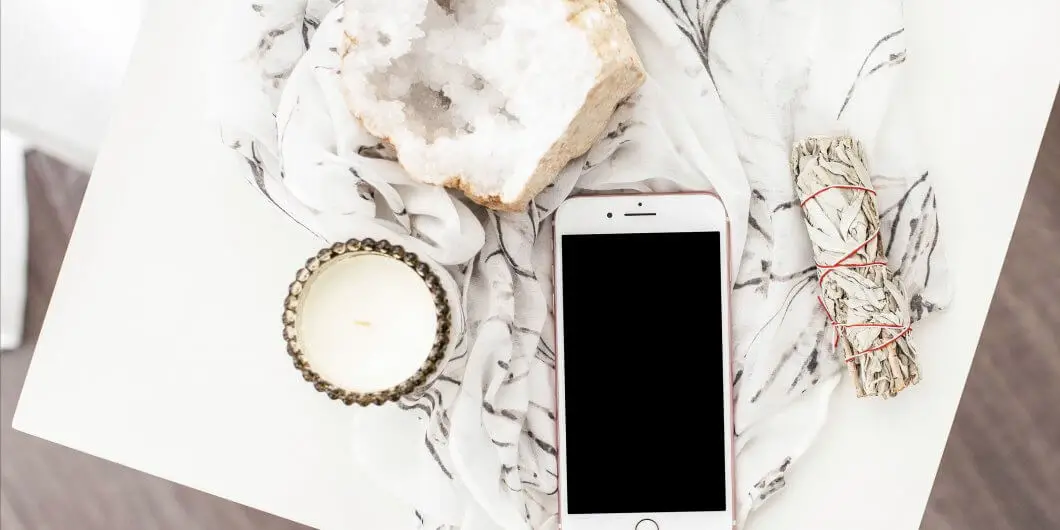 cell phone on white desk